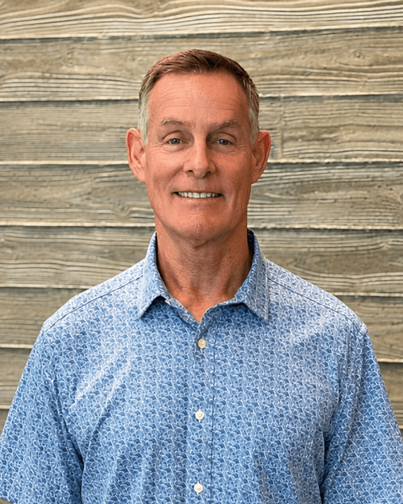 Portrait of John Dempsey, CEO